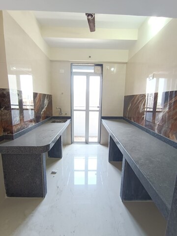 Kitchen in 1 BHK Apartment at Yogi Ajmera Bliss, Kalyan West – for Rent
