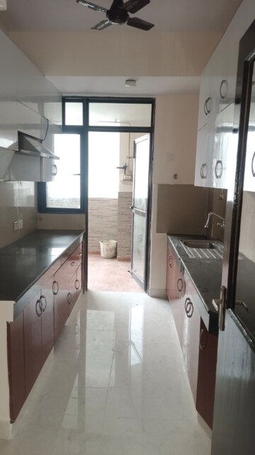 Kitchen in 3.5 BHK Apartment at Eldeco Aamantran, Sector 119 – for Rent