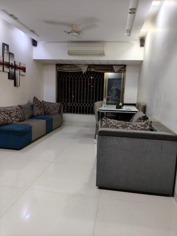 Living Room in 2 BHK Apartment at Palash Towers, Andheri West – for Rent