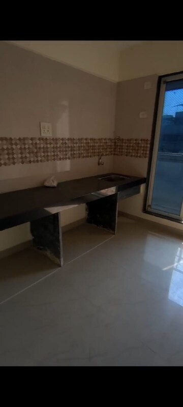 Kitchen in 2 BHK Apartment at Anmol Mansion CHS, Charai – for Sale