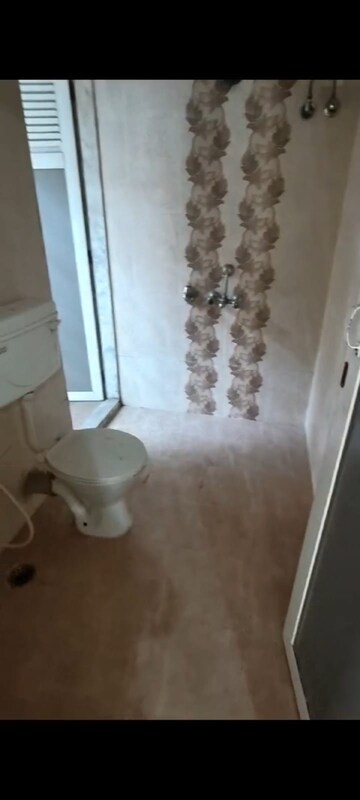 Attached Bathroom in 2 BHK Apartment at Anmol Mansion CHS, Charai – for Sale