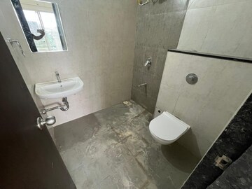 Bathroom in 3 BHK Apartment at Mantra Insignia, Mundhwa – for Rent