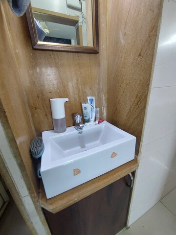 Bathroom in 1 BHK Apartment at Kanakia Apartments, Mira Road – for Rent
