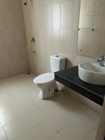 Bathroom in 3 BHK Builder Floor at Ace Palm Floors, Sector 89 – for Rent