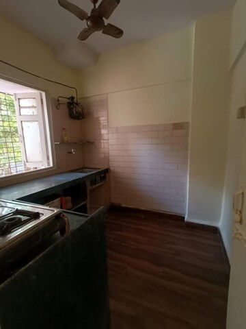 Kitchen in 1 BHK Apartment at Kirit CHS, Malad West – for Sale