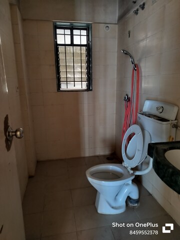 Bathroom in 2 BHK Apartment at DSK Meghmalhar Phase I, Sinhagad Road – for Sale