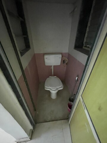 Bathroom in 2 BHK Apartment at RNA Courtyard, Mira Road – for Rent