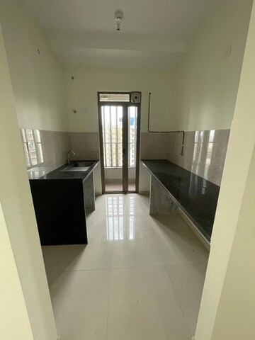 Kitchen in 2 BHK Apartment at Kalpataru Paramount, Kapur Bawdi – for Rent