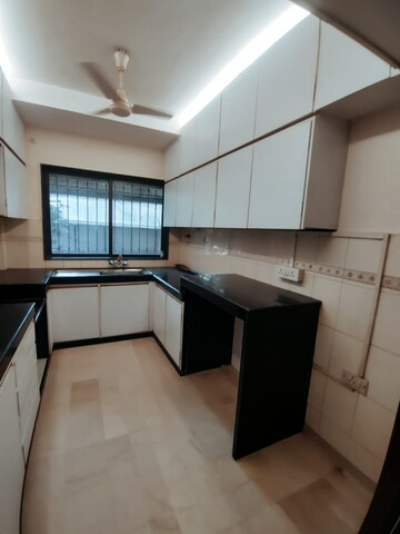 Kitchen in 3 BHK Apartment at Menghputra Apartment, Juhu – for Rent