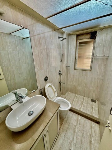 Bathroom in 3 BHK Apartment at Menghputra Apartment, Juhu – for Rent
