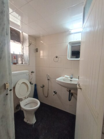 Bathroom in 2 BHK Apartment at Sea Pebbles Apartment, Bandra West – for Rent