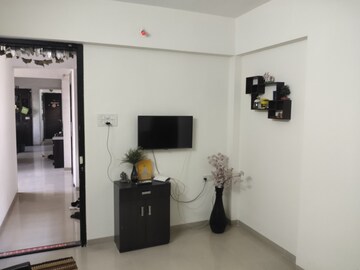 Living Room in 2 BHK Apartment at Shree Anand Royal Castle, Thergaon – for Rent