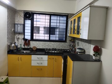 Kitchen in 2 BHK Apartment at Shree Anand Royal Castle, Thergaon – for Rent