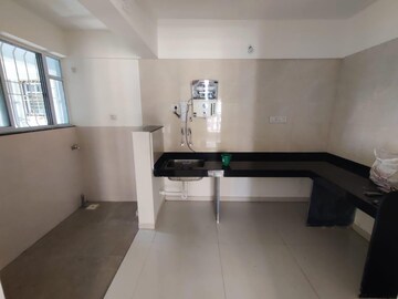 Kitchen in 2 BHK Apartment at AUM Miravet District, Ravet – for Sale