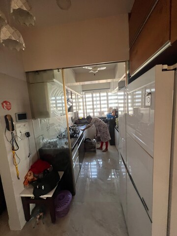 Kitchen in 2 BHK Apartment at Omkar Om Residency, Parel – for Sale