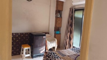 Living Room in 1 BHK Apartment at Vijay Nagari Annex, Waghbil – for Rent