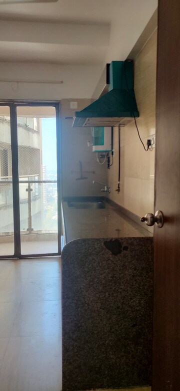 Kitchen in 2.5 BHK Apartment at HDIL Metropolis Residences, Andheri West – for Sale