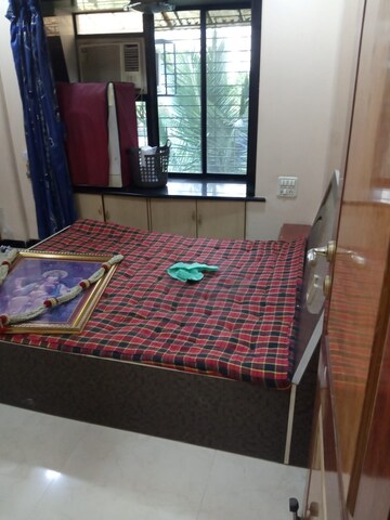 Bedroom in 2 BHK Apartment at Arjun CHS Vasant Vihar, Vasant Vihar – for Rent