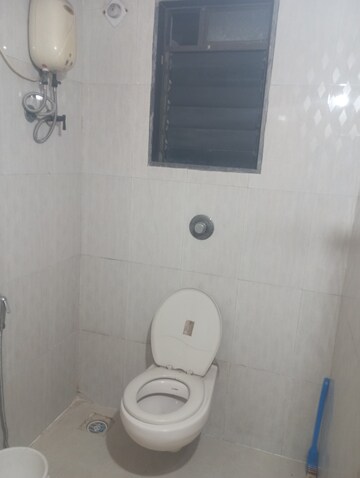 Bathroom in 2 BHK Apartment at Bathija Siddhivinayak Twins, Roadpali – for Rent