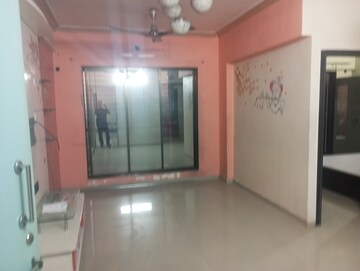 Living Room in 2 BHK Apartment at Bathija Siddhivinayak Twins, Roadpali – for Rent