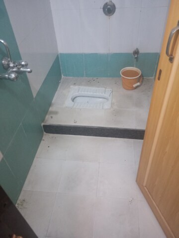 Bathroom in 2 BHK Apartment at Bathija Siddhivinayak Twins, Roadpali – for Rent