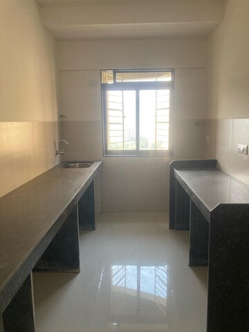 Kitchen in 2 BHK Apartment at Acme Ozone, Manpada – for Sale