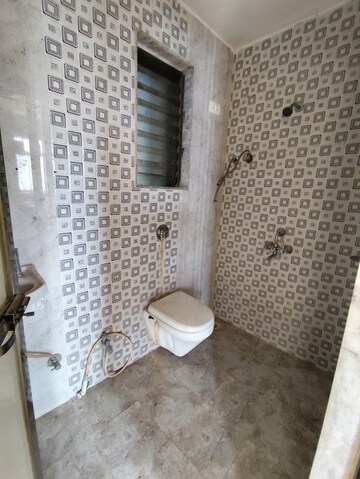 Bathroom in 1 BHK Apartment at Ideal Pristine Tower, Kasarvadavali – for Rent