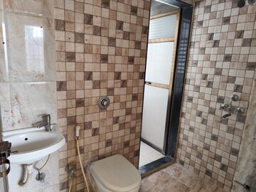 Bathroom in 1 BHK Apartment at Ideal Pristine Tower, Kasarvadavali – for Rent