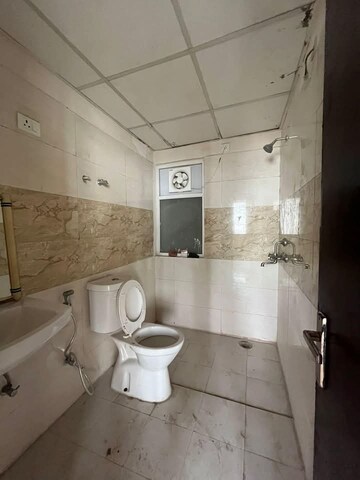 Bathroom in 2 BHK Apartment at Amrapali Golf Homes, Sector 4, Greater Noida – for Sale
