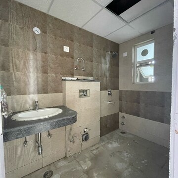 Attached Bathroom in 3 BHK Apartment at Cosmos Express 99, Gopalpur – for Sale