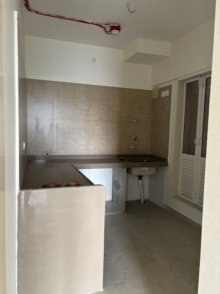 Kitchen, dosti-west-county-phase-4-dosti-pine 2 Bedroom 695 Sq.Ft. Apartment In Balkum Pada Thane 7883790