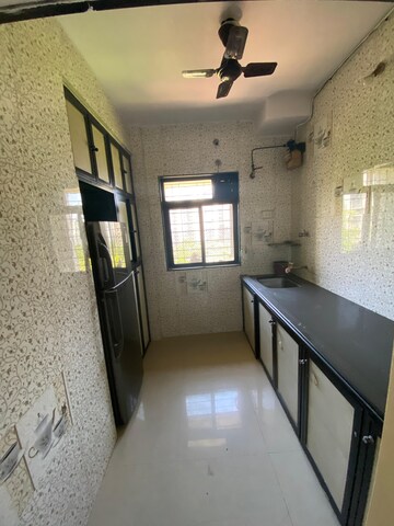 Kitchen in 2 BHK Apartment at Vijay Garden, Ghodbunder Road – for Sale