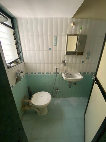 Attached Bathroom in 1 BHK Apartment at Vijay Vatika, Kavesar – for Sale