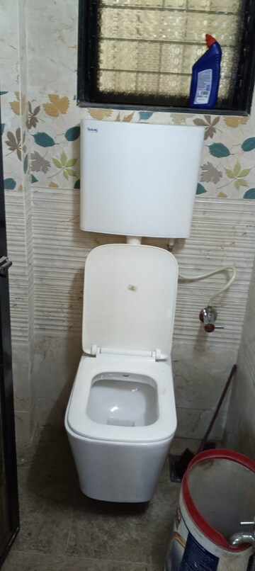 Bathroom in 2 BHK Apartment at RNA Courtyard, Mira Road – for Rent
