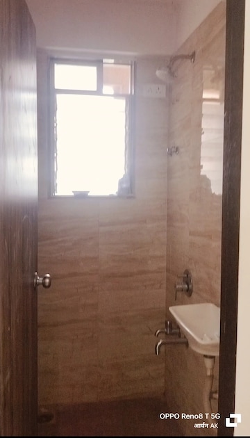 Bathroom in 1 BHK Apartment at Squarefeet Joy square, Kasarvadavali – for Rent