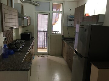 Kitchen in 3 BHK Apartment at Amrapali Platinum, Sector 119 – for Sale
