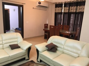 Living Room in 3 BHK Apartment at Amrapali Platinum, Sector 119 – for Sale