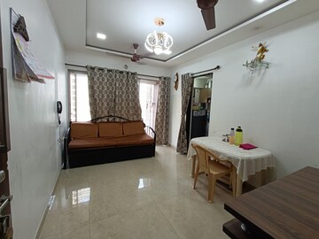Living Room in 1 BHK Apartment at RNA NG Ocean Pearl, Mira Road – for Sale