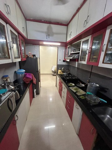 Kitchen in 2 BHK Apartment at Happy Valley, Manpada – for Rent