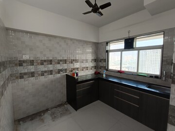 Kitchen in 2 BHK Apartment at Ayodhya Saffron Residency, Kurla – for Rent