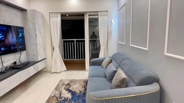 Living Room in 2 BHK Apartment at Lodha Amara, Kolshet Road – for Sale