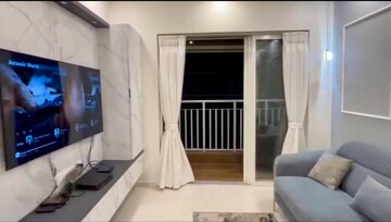 Living Room in 2 BHK Apartment at Lodha Amara, Kolshet Road – for Sale