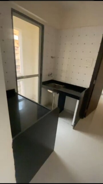 Kitchen in 1 BHK Apartment at Seven Apna Ghar Phase 2 Plot B, Mira Road – for Sale