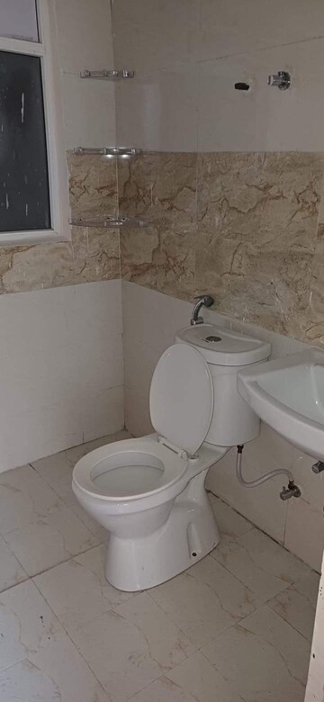 Bathroom in 2 BHK Apartment at Amrapali Golf Homes, Sector 4, Greater Noida – for Sale