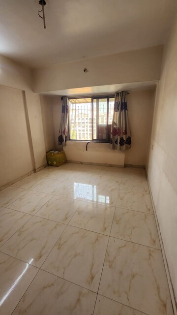 Room in 1 BHK Apartment at Omkar Signet, Malad East – for Rent