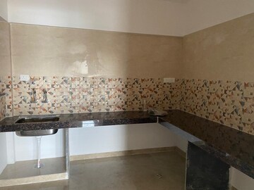 Kitchen in 3 BHK Apartment at Lotus The Address, Moshi – for Rent