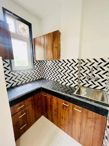 Kitchen in 3 BHK Apartment at Vipul Greens, Sector 48 – for Sale