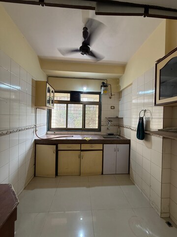 Kitchen in 1 BHK Apartment at Raj Utsav Apartment, Dahisar East – for Sale
