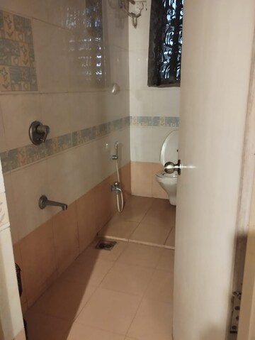 Bathroom in 2 BHK Apartment at Cosmos Apartment, Hadapsar – for Rent