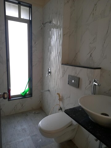Bathroom in 3 BHK Apartment at Vasant Fiona, Pokhran Road No 2 – for Rent